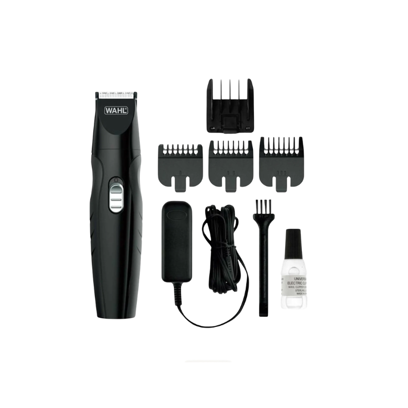 Black Wahl cordless hair trimmer shown with multiple guide combs, a cleaning brush, a small bottle of liquid, and a power adapter on a plain white background.