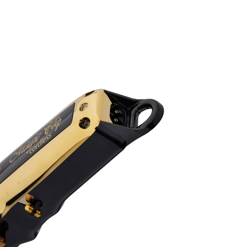 Close-up of a cordless vape device with a gold and black metallic finish, featuring the text 'Magic Vap cordless' on the side, set against a plain white background.