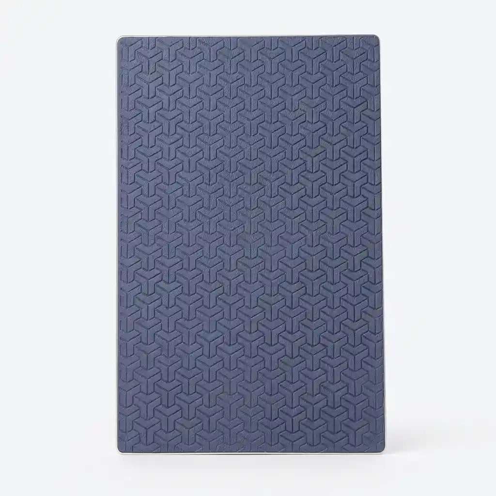 A rectangular blue textured mat with a repeating geometric embossed pattern, shown against a plain white background.