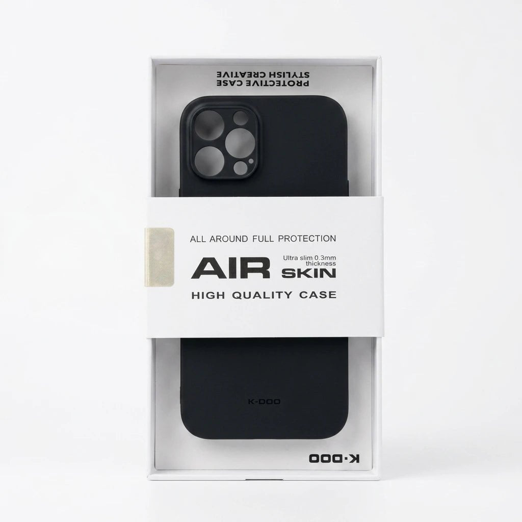 A black protective phone case displayed inside its white retail packaging, with the brand name KODO visible on the box.