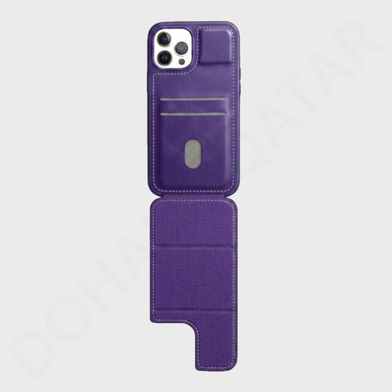 A purple folio-style phone case shown open against a light gray background, with card slots and a camera cutout visible.