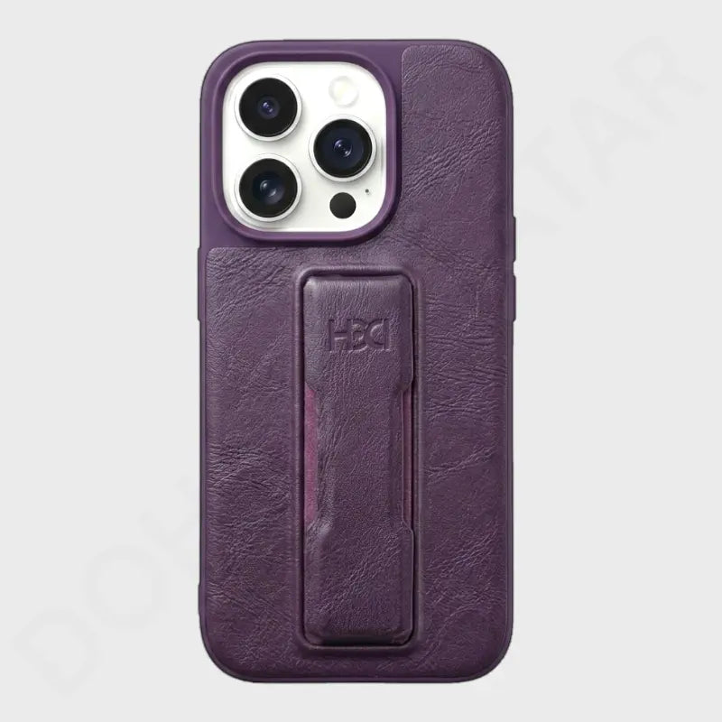 A dark purple textured leather phone case with a built-in kickstand, shown on a light gray background. The case features a raised camera bezel and an embossed 'H3C' logo on the kickstand.