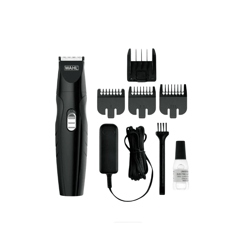 Black Wahl cordless hair trimmer shown with multiple guide combs, a cleaning brush, a small bottle of liquid, and a power adapter on a plain white background.